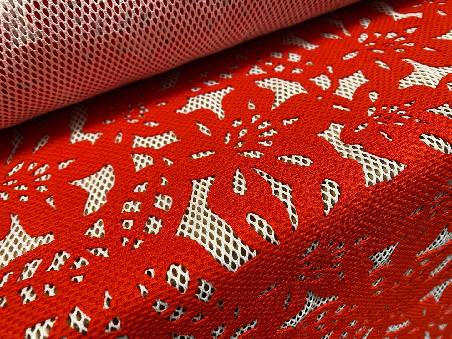 Fishnet fabric with bonded floral overlay, per metre - flower design - red on white