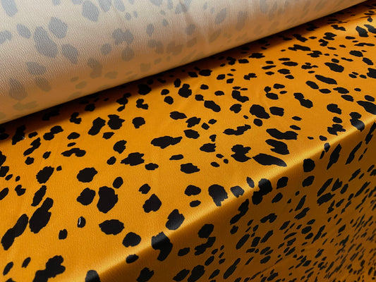 Stretch sateen woven dress fabric, per metre - Dalmatian print - honey & black