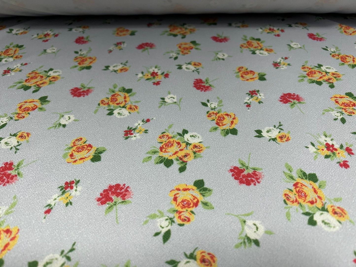 Valentino crepe spandex jersey fabric - similar to scuba - per metre - ditsy flowers print - Sky blue & Orange