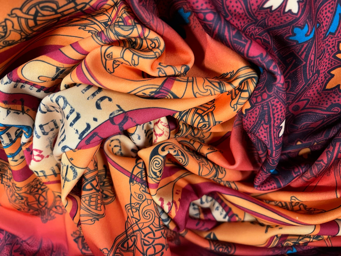 Scuba neoprene style spandex stretch double jersey fabric, per metre - Celtic braid print - Orange & wine