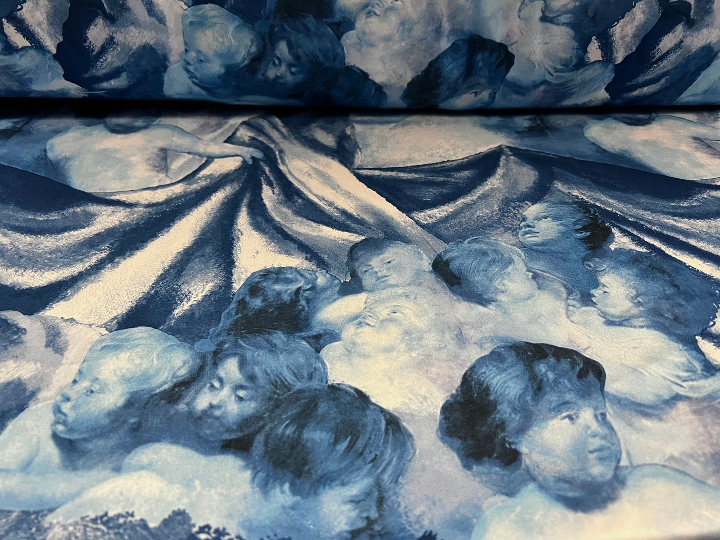 Printed pongee woven dress fabric, per metre - cherub angels print - blue