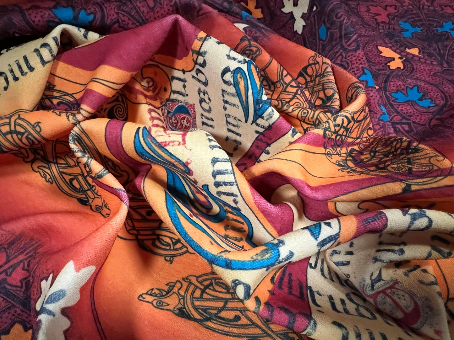 Stretch spandex single jersey fabric, per metre - Celtic braid print - Orange & wine