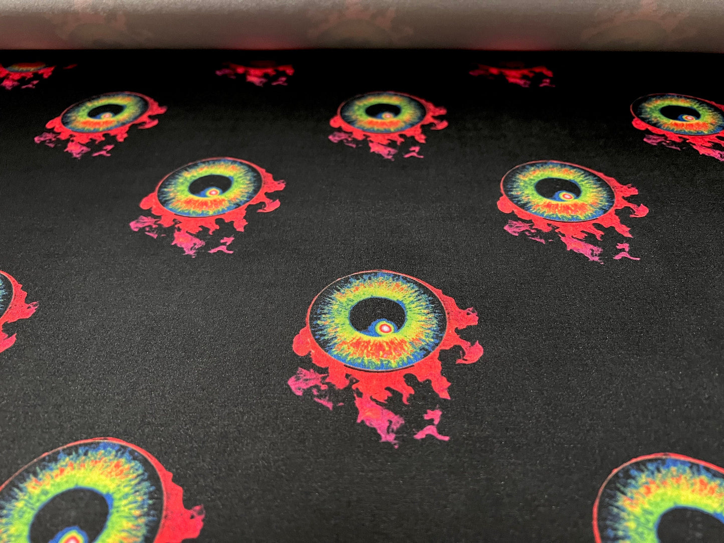 Soft touch stretch spandex single jersey fabric, per metre - flaming eyeball tattoo print - black & red