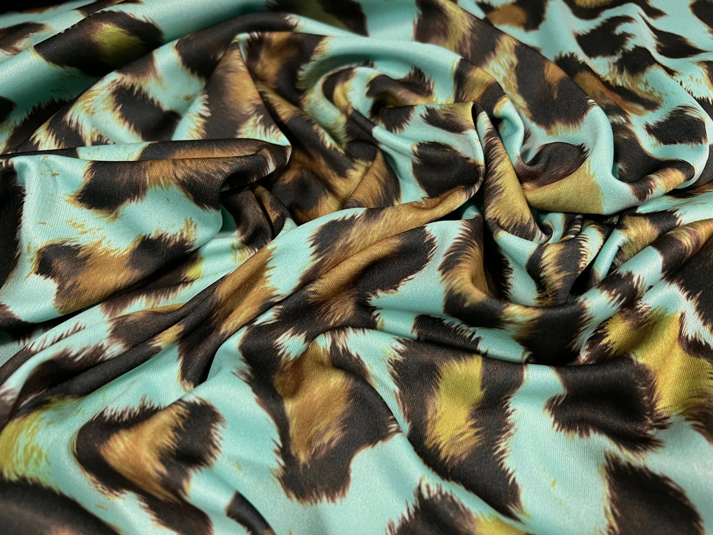 Single jersey polyester fabric - 60 inches wide - leopard animal print - turquoise