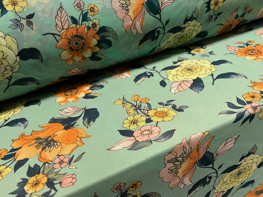 Power mesh net stretch spandex fabric, per metre - flower print - mint green