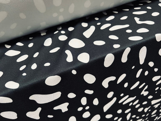 Scuba crepe  stretch spandex jersey dress fabric, per metre - puddle print - black & white