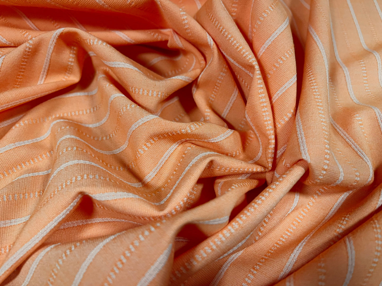 Woven stretch spandex raised pinstripe in a stripe fabric, per metre - orange