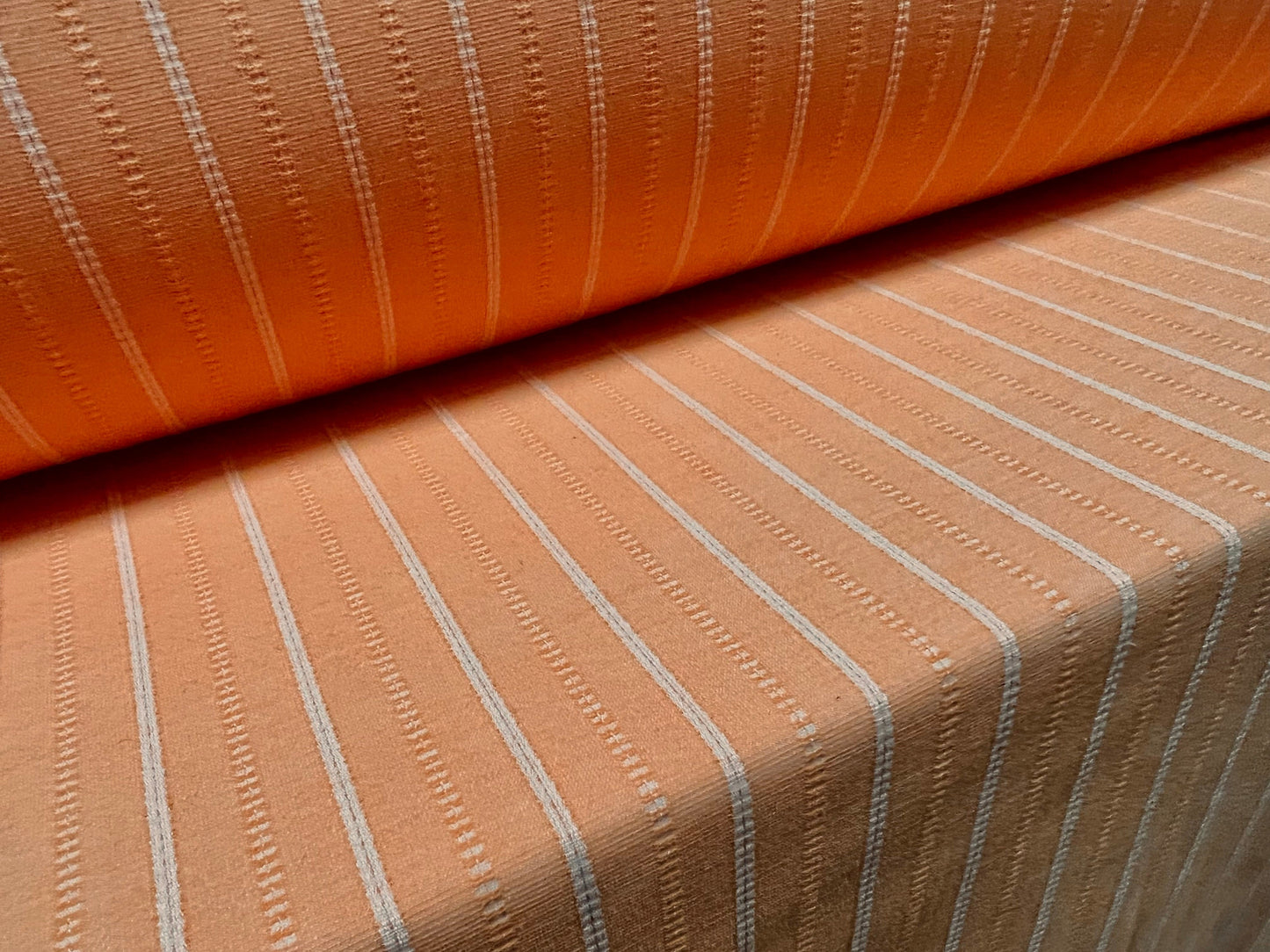 Woven stretch spandex raised pinstripe in a stripe fabric, per metre - orange