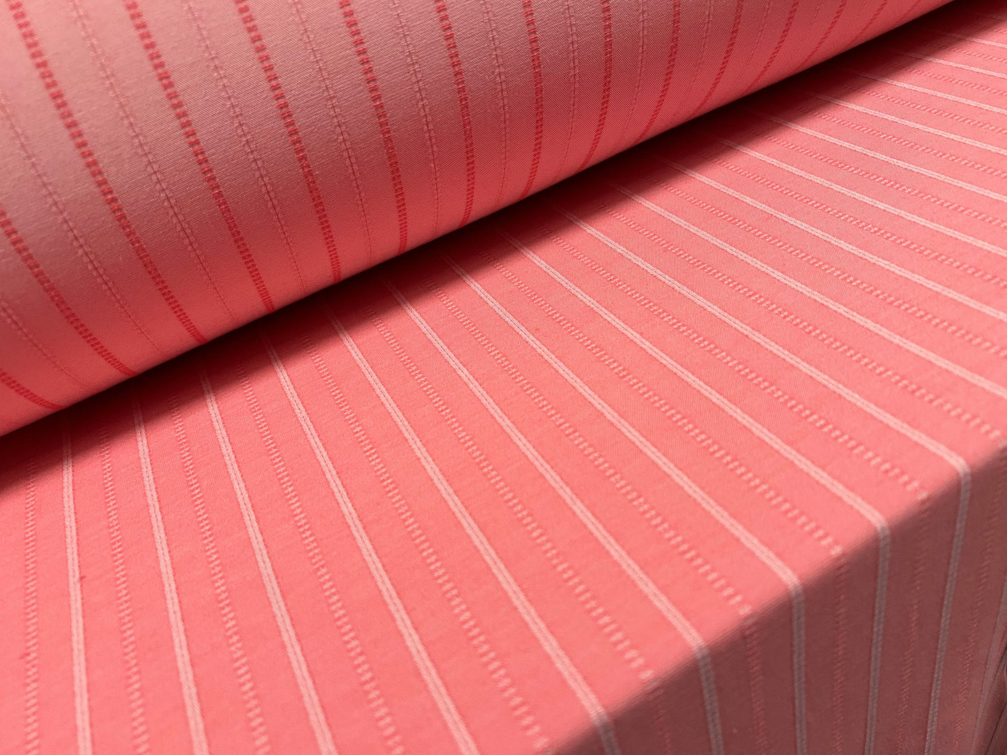 Woven stretch spandex raised pinstripe in a stripe fabric, per metre - pink