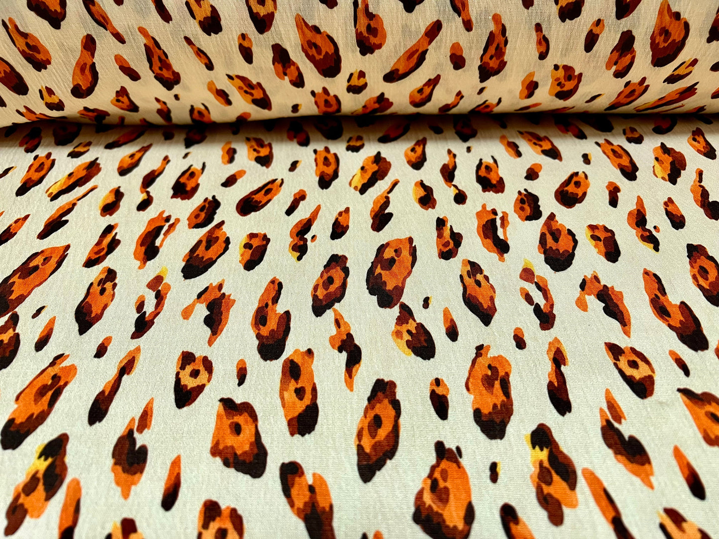 Single jersey fashion fabric, per metre - distressed Leopardskin animal print - cream & orange