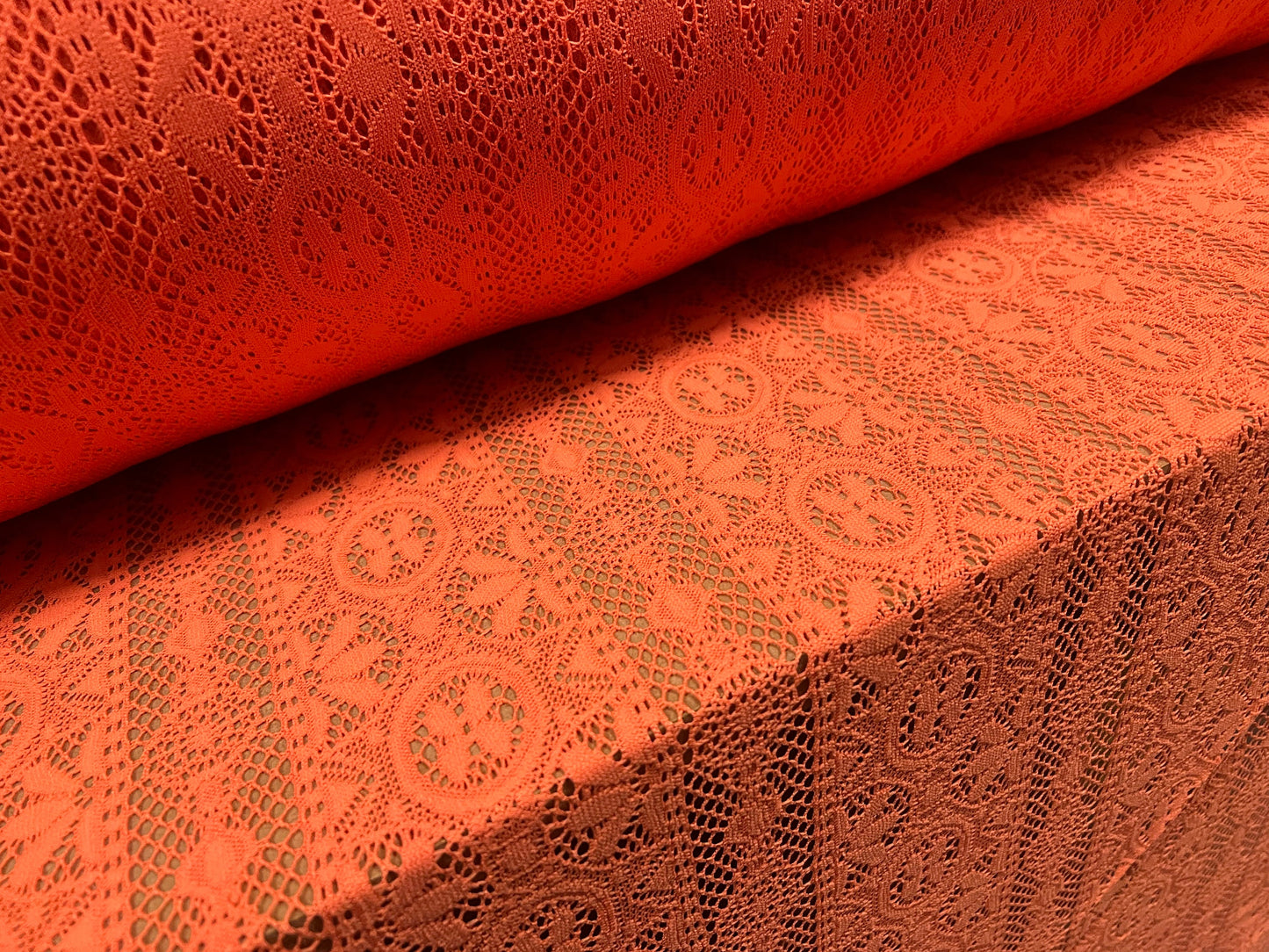 Soft handle crochet lace knit fabric, per metre - coral
