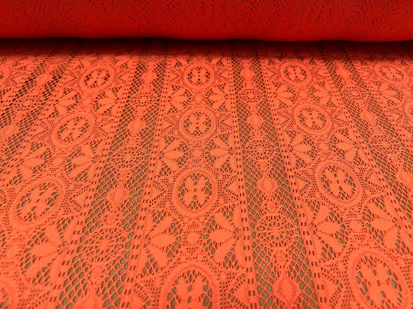 Soft handle crochet lace knit fabric, per metre - coral