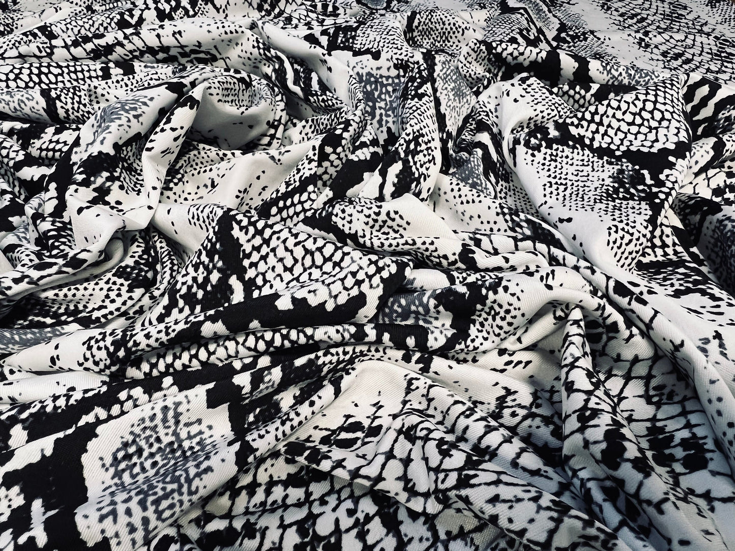 Soft touch spandex stretch single jersey fabric, per metre - snakeskin print - white grey & black