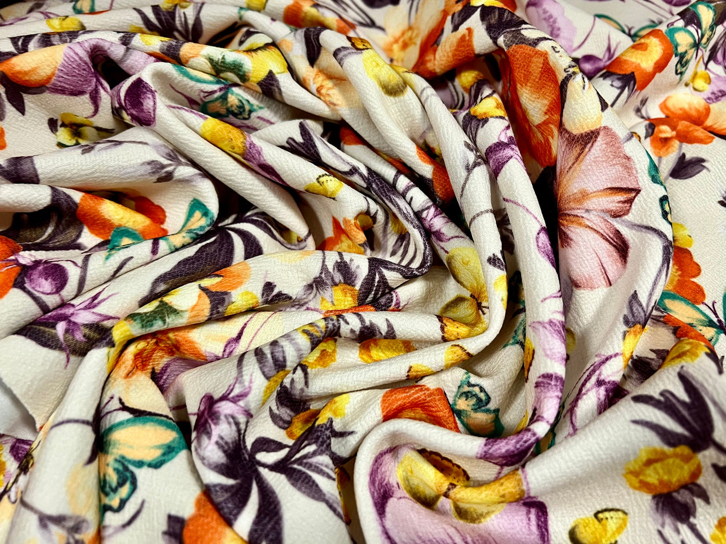 Scuba textured ‘Liverpool’ stretch spandex jersey fabric, per metre - Cream with orange and lilac flowers & butterflies print