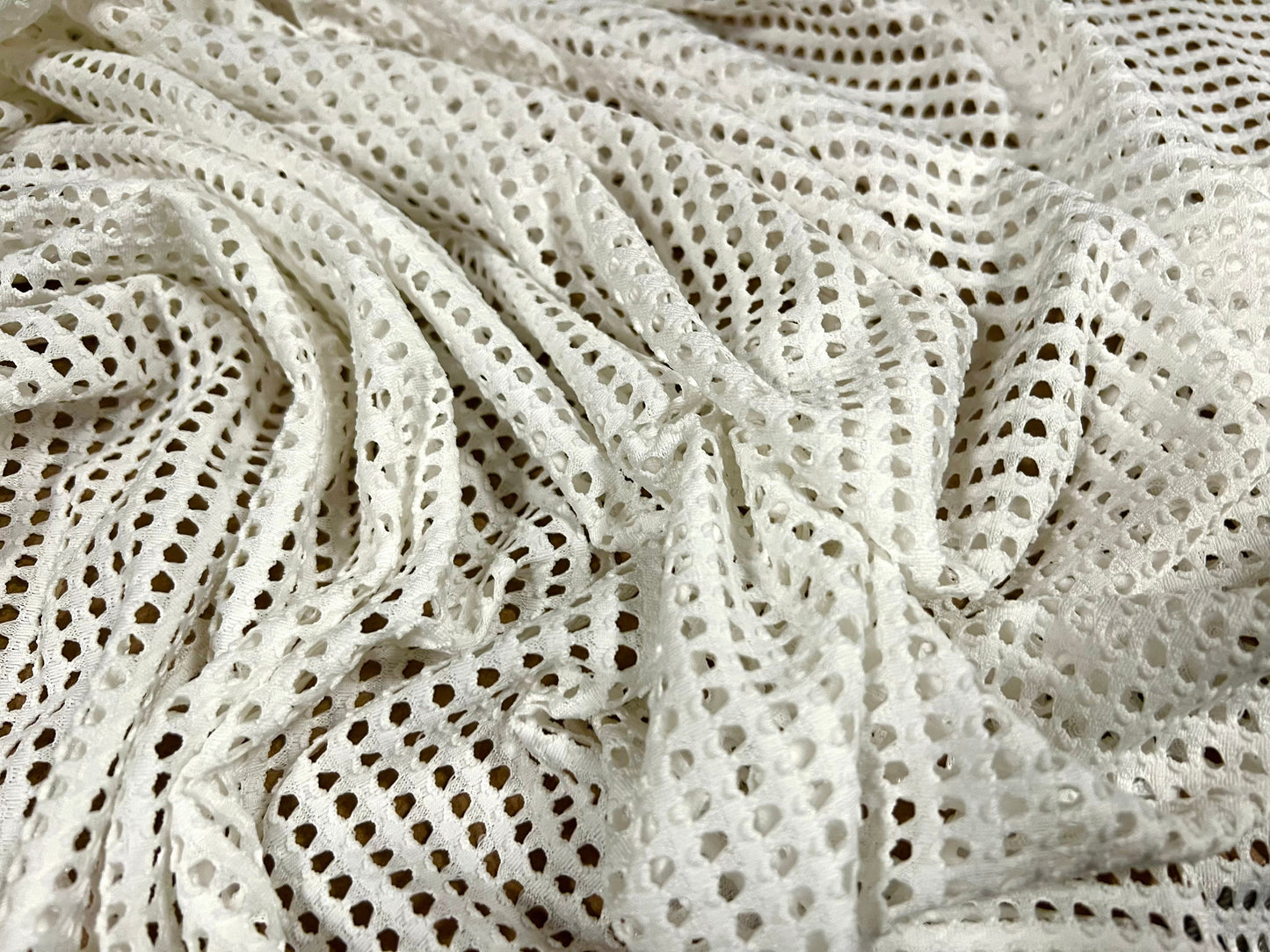 Textured eyelet mesh stretch spandex jersey fabric, per metre - ivory