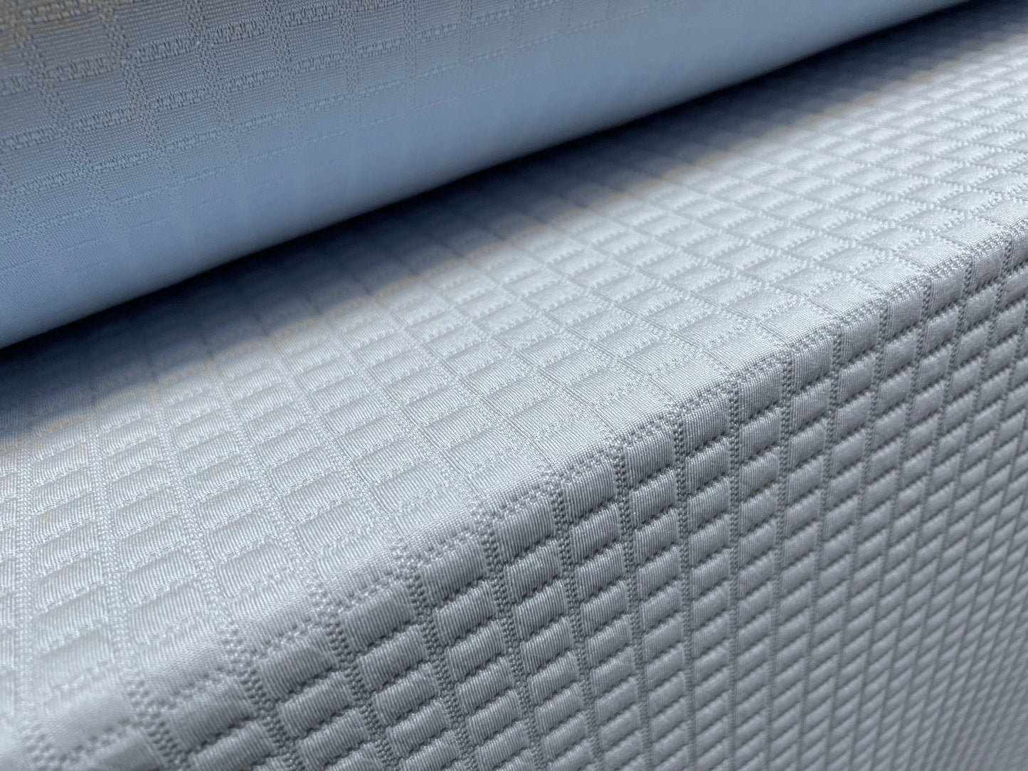 Mock quilted double jersey spandex fabric, per metre - geometric squares design - baby blue