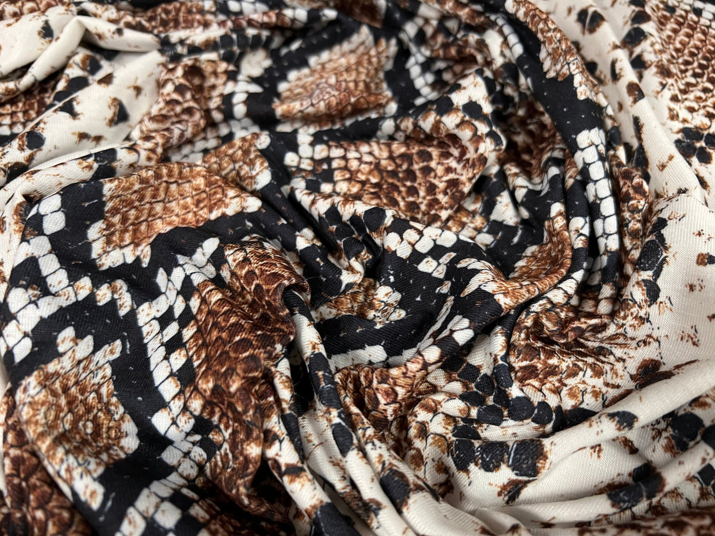 Soft handle stretch spandex single jersey fabric, per metre - snakeskin animal print - bronze & black