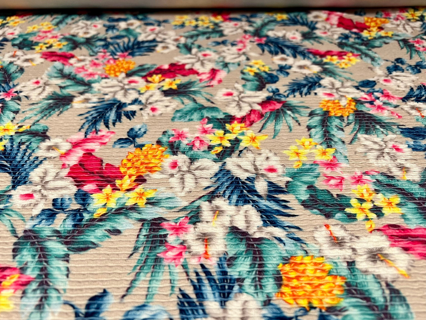 Textured spandex ribbed jersey fabric, per metre - Hawaiian Garden print - grey with multicolour flowers