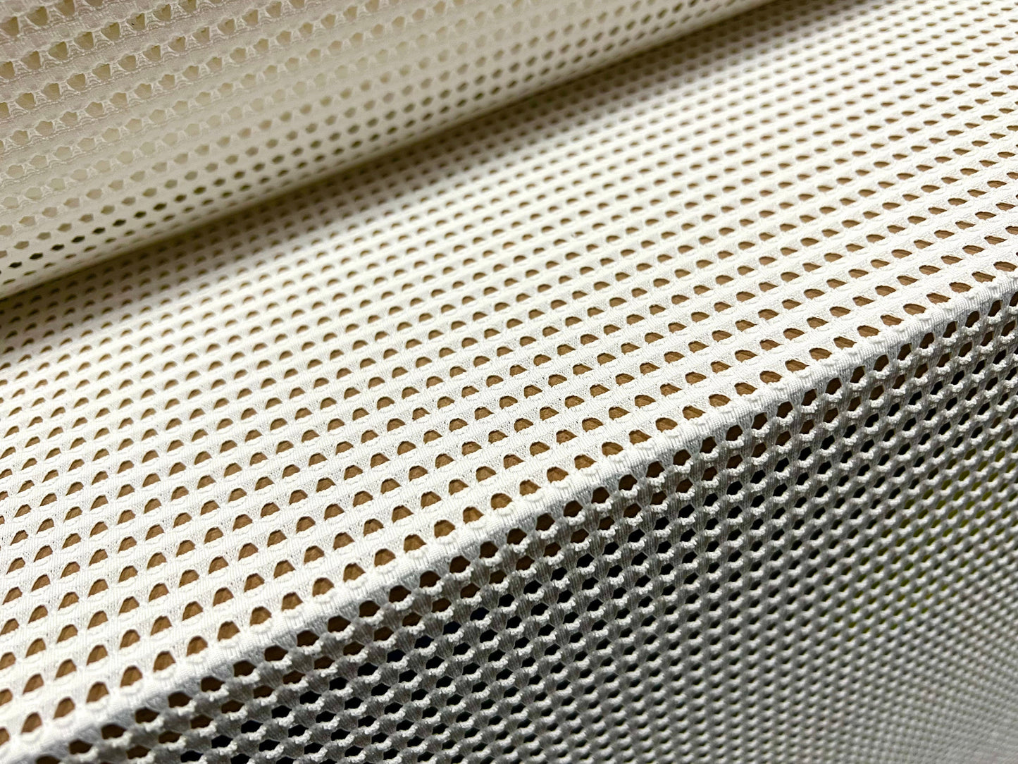 Textured eyelet mesh stretch spandex jersey fabric, per metre - ivory