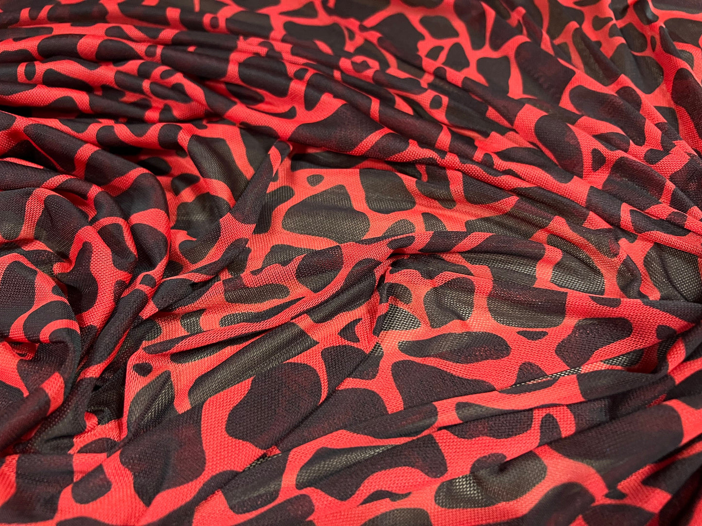 Power mesh net stretch spandex fabric, per metre - giraffe animal print - red & black