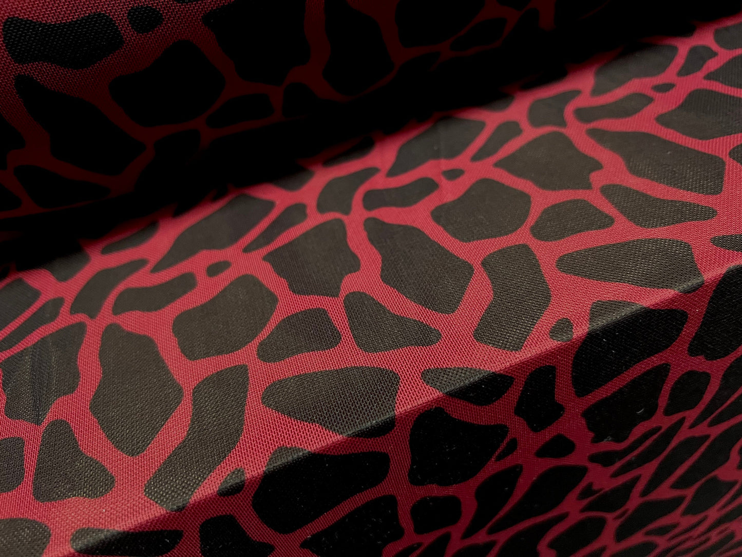 Power mesh net stretch spandex fabric, per metre - giraffe animal print - bordeaux & black