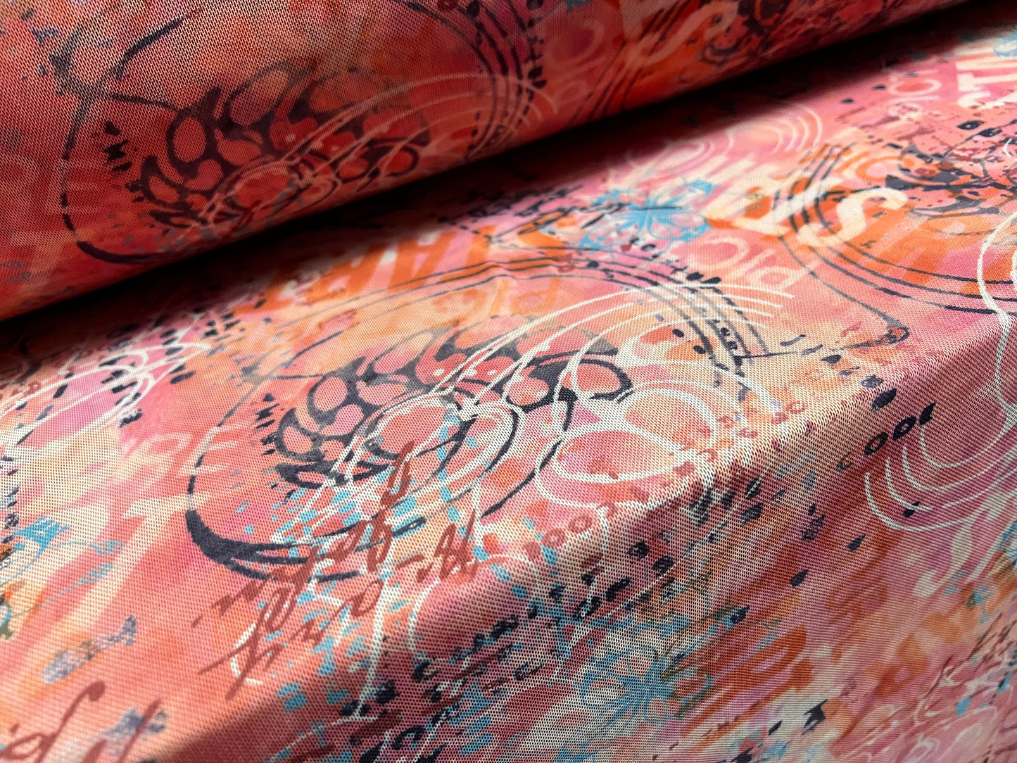 Power mesh net stretch spandex fabric, per metre - graffiti scribble print - pink