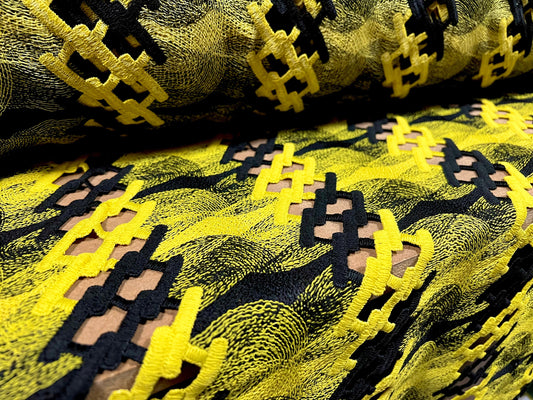 Couture dress fabric, per metre - chain link swirl embroidery - black & yellow