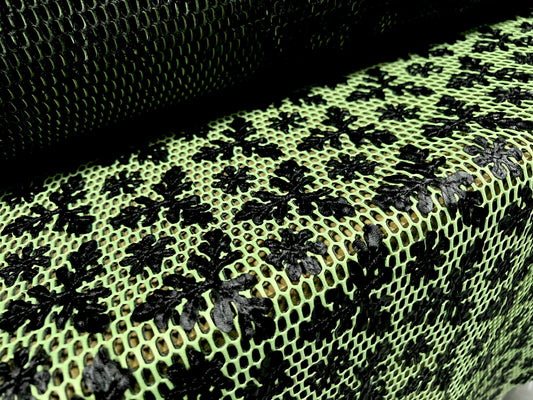 Couture fabric, per metre - 3D scuba mesh with floral appliqué - black on green