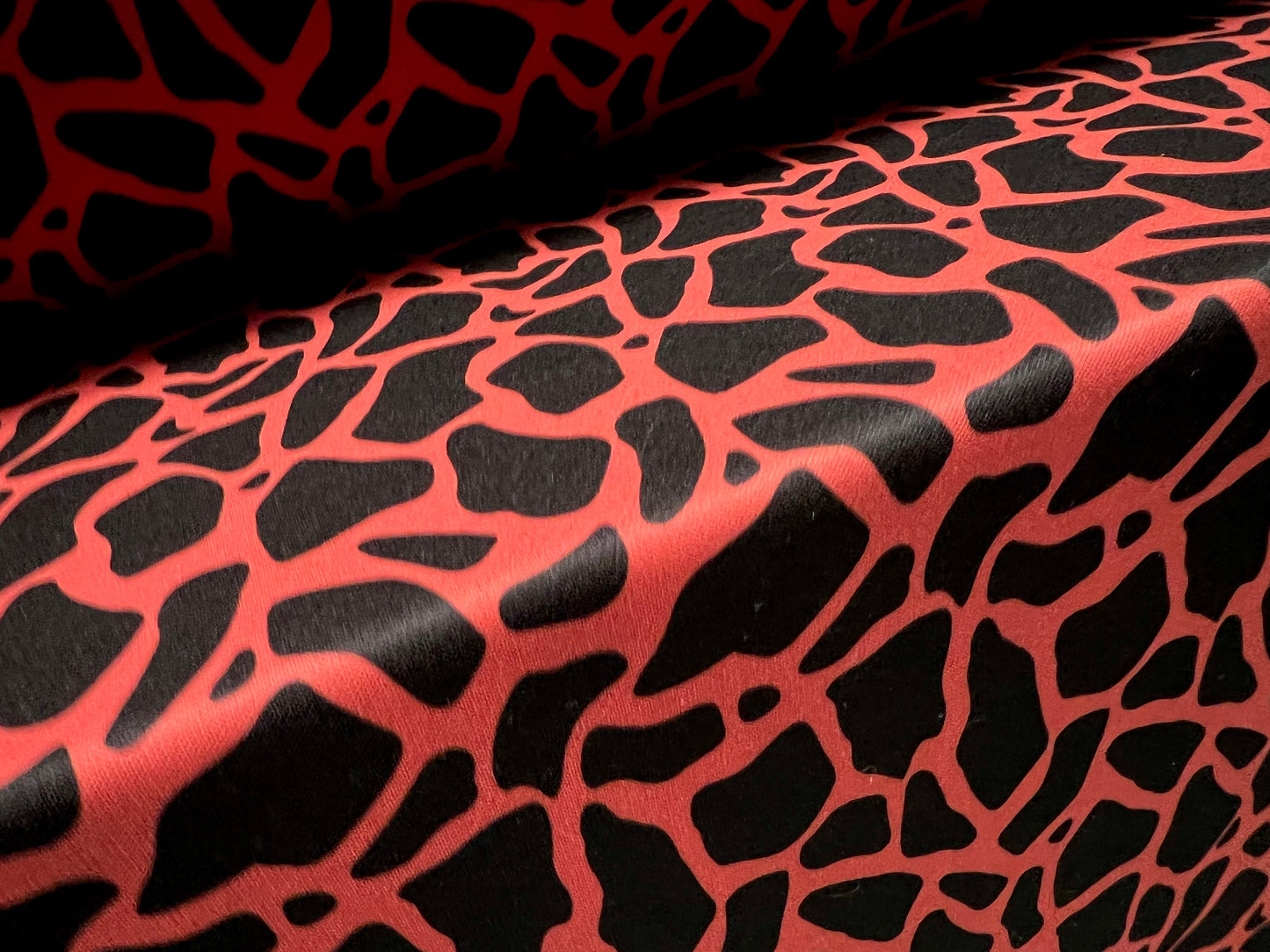 Scuba neoprene style double jersey stretch fabric, per metre - giraffe animal print - orange & black
