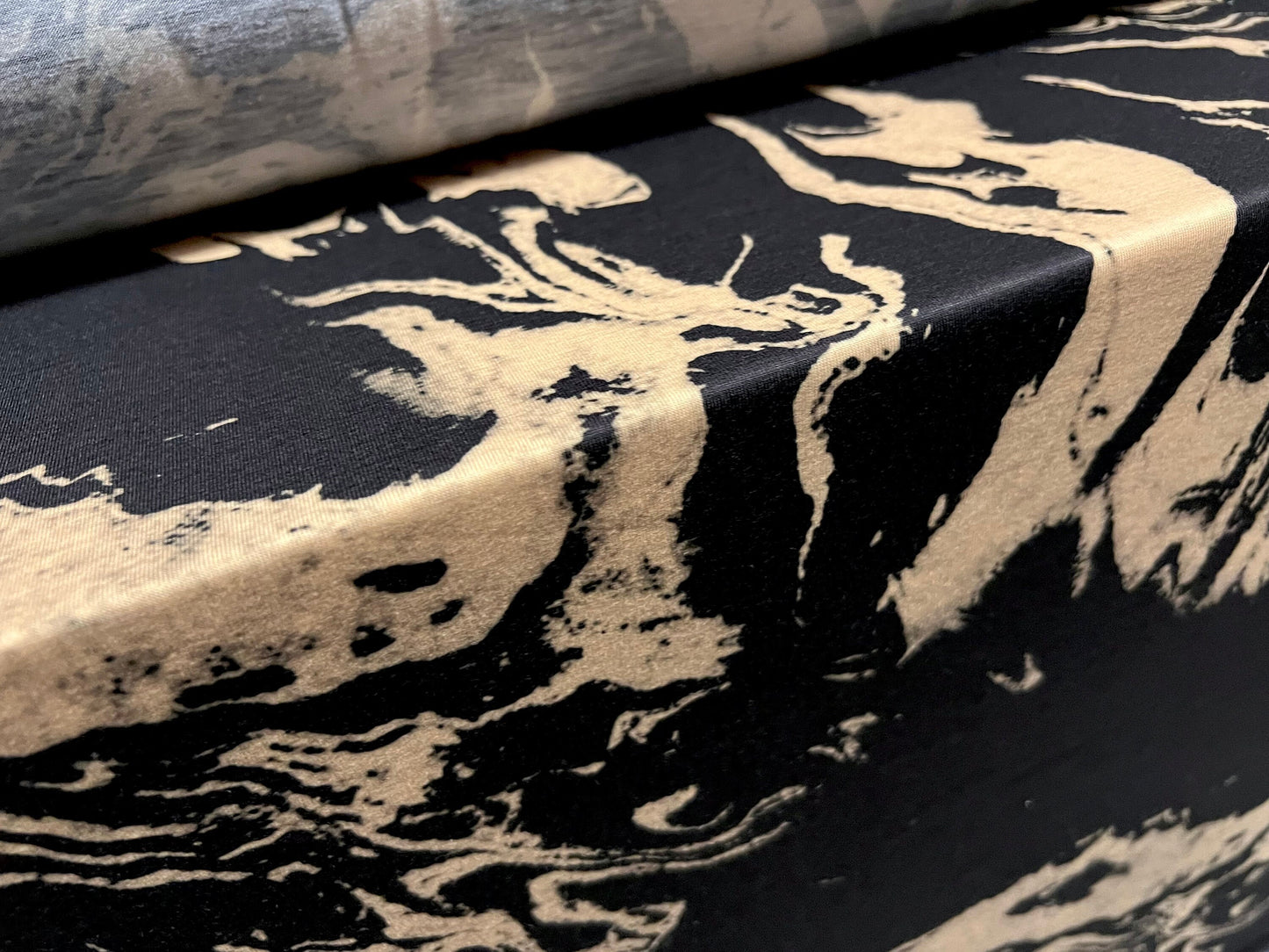 Soft handle stretch spandex jersey fabric, per metre - paint spill print - black & tan