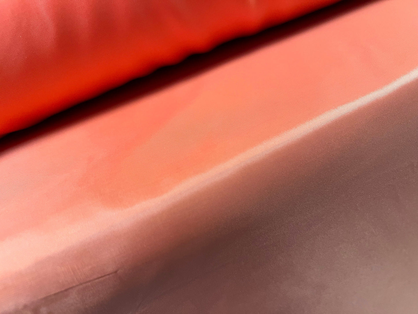 Woven polyester lining fabric, per metre - plain - peach Melba