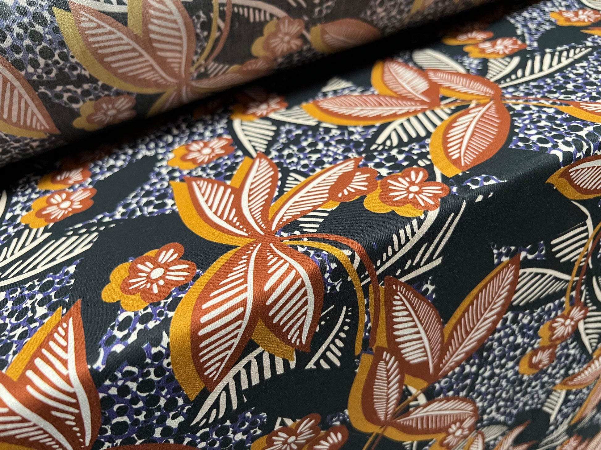Cotton lawn woven dress fabric, per metre - floral print - black & terracotta Cotton lawn woven dress fabric, per metre - floral print - black & terracotta