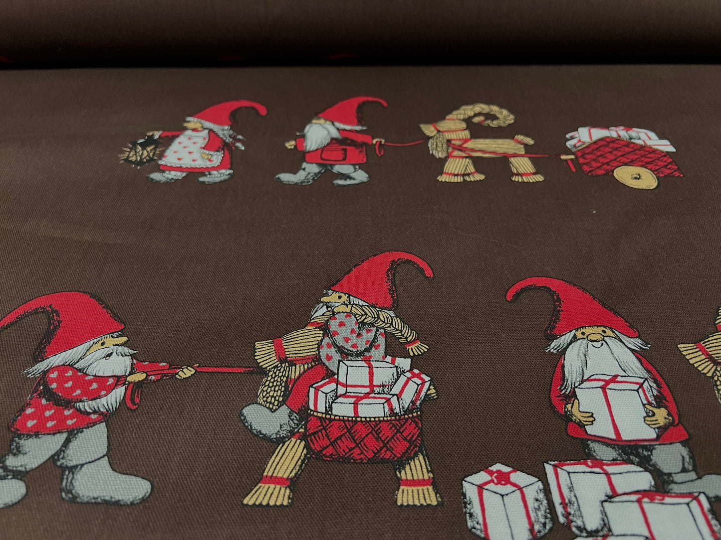 Woven cotton fabric, per metre - Santa and Mrs Claus Christmas present print - brown