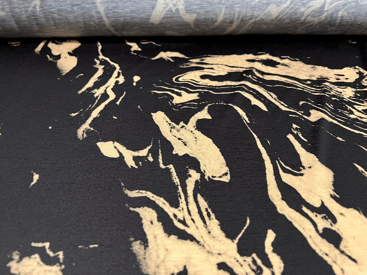 Soft handle stretch spandex jersey fabric, per metre - paint spill print - black & tan