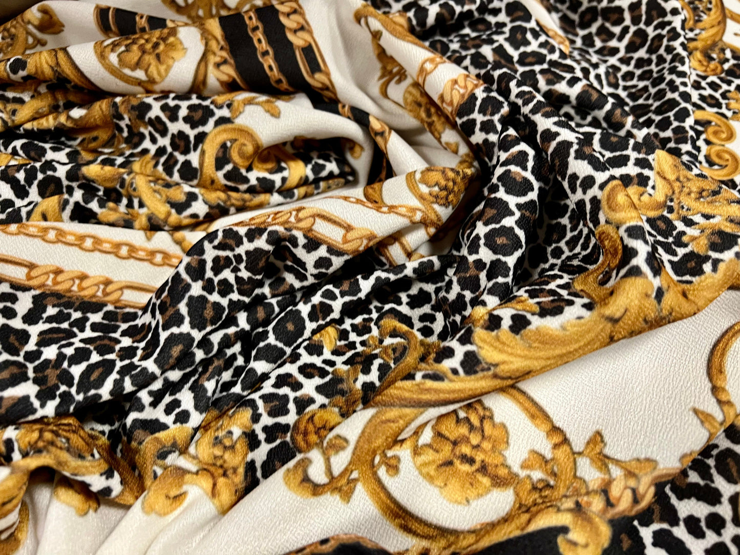 Valentino crepe spandex jersey fabric - similar to scuba - per metre - designer Leopardskin & gold chains print