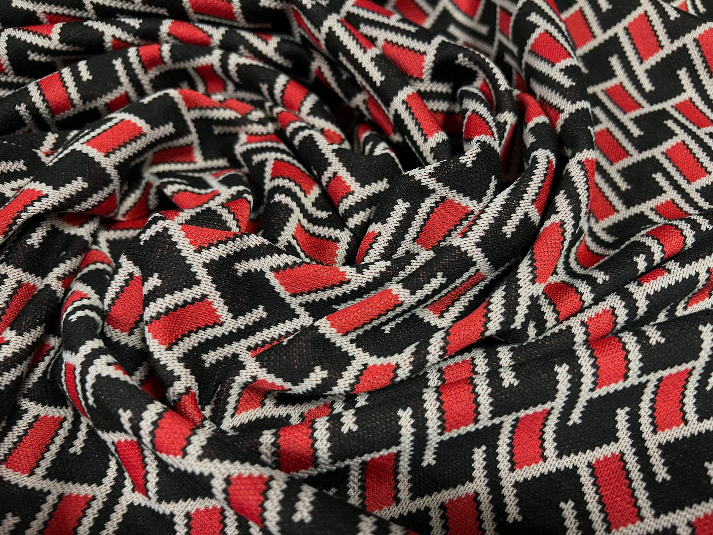 Double jersey stretch spandex fabric, per metre - geometric design - red & black