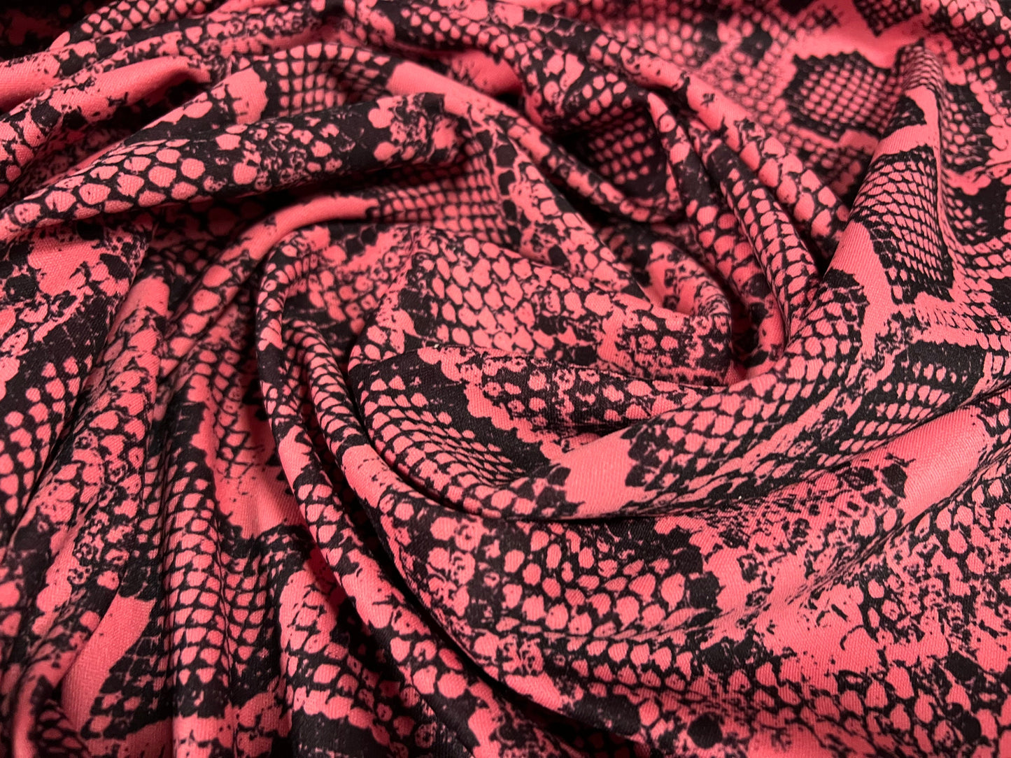 Scuba crepe stretch spandex jersey fashion fabric, per metre - snakeskin animal print - pink & black
