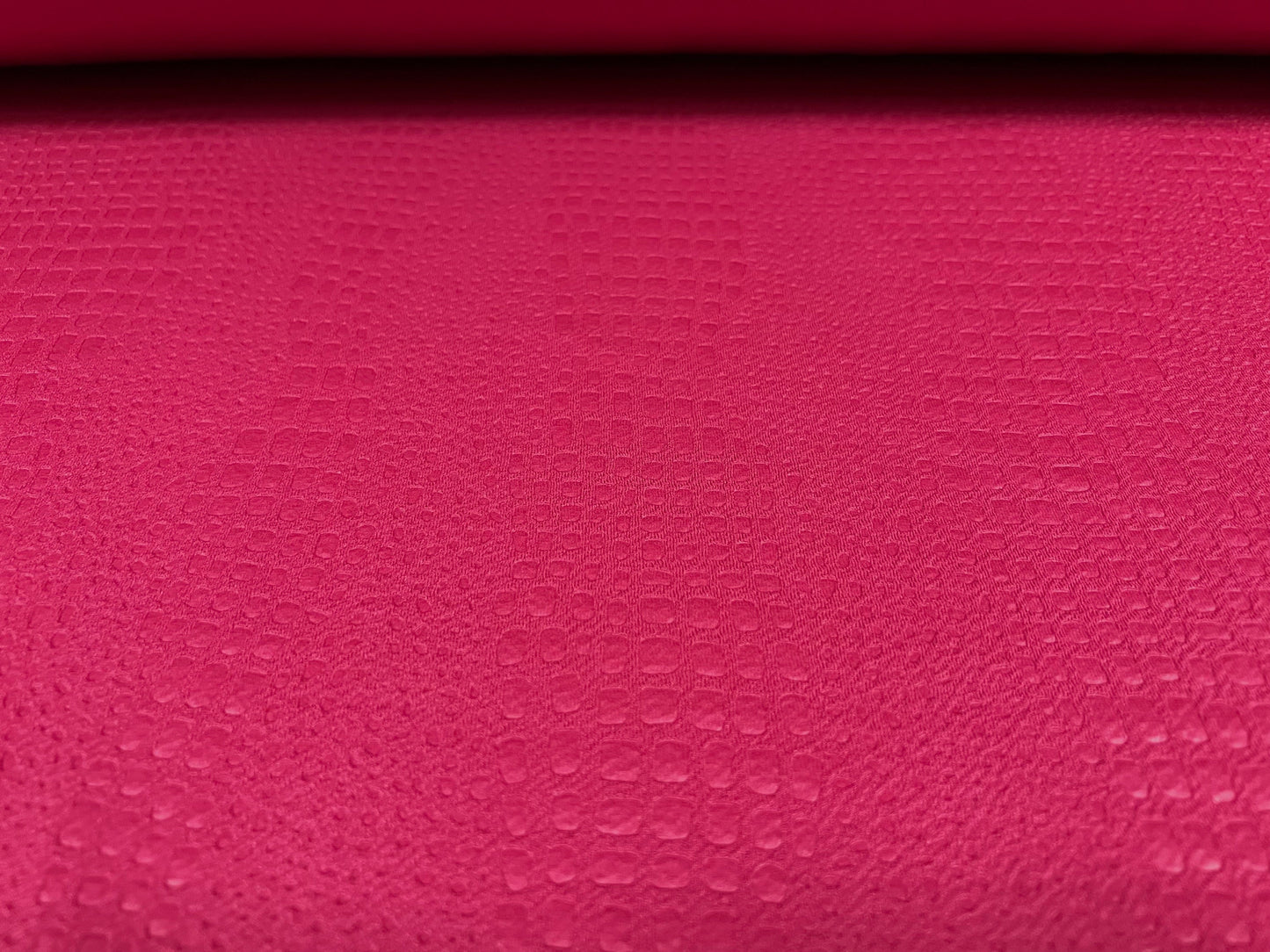 Scuba neoprene style spandex jersey fabric, per metre - embossed crocodile design - fuchsia pink