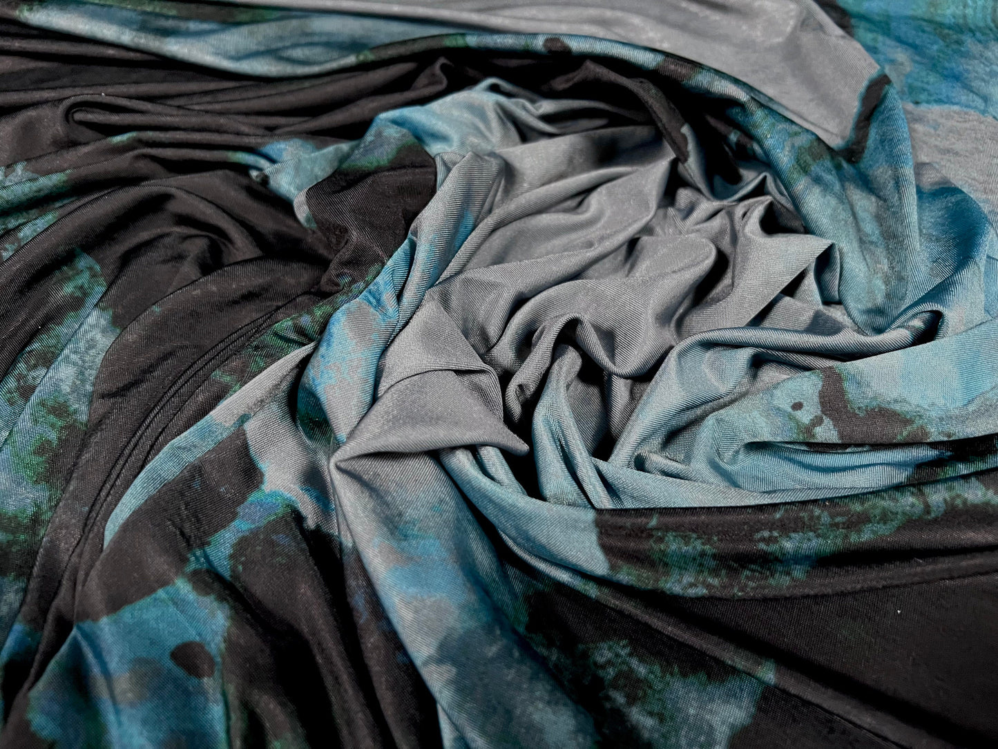 Disco shimmer stretch spandex jersey fabric, per metre - oil spill print - black & Petrol blue