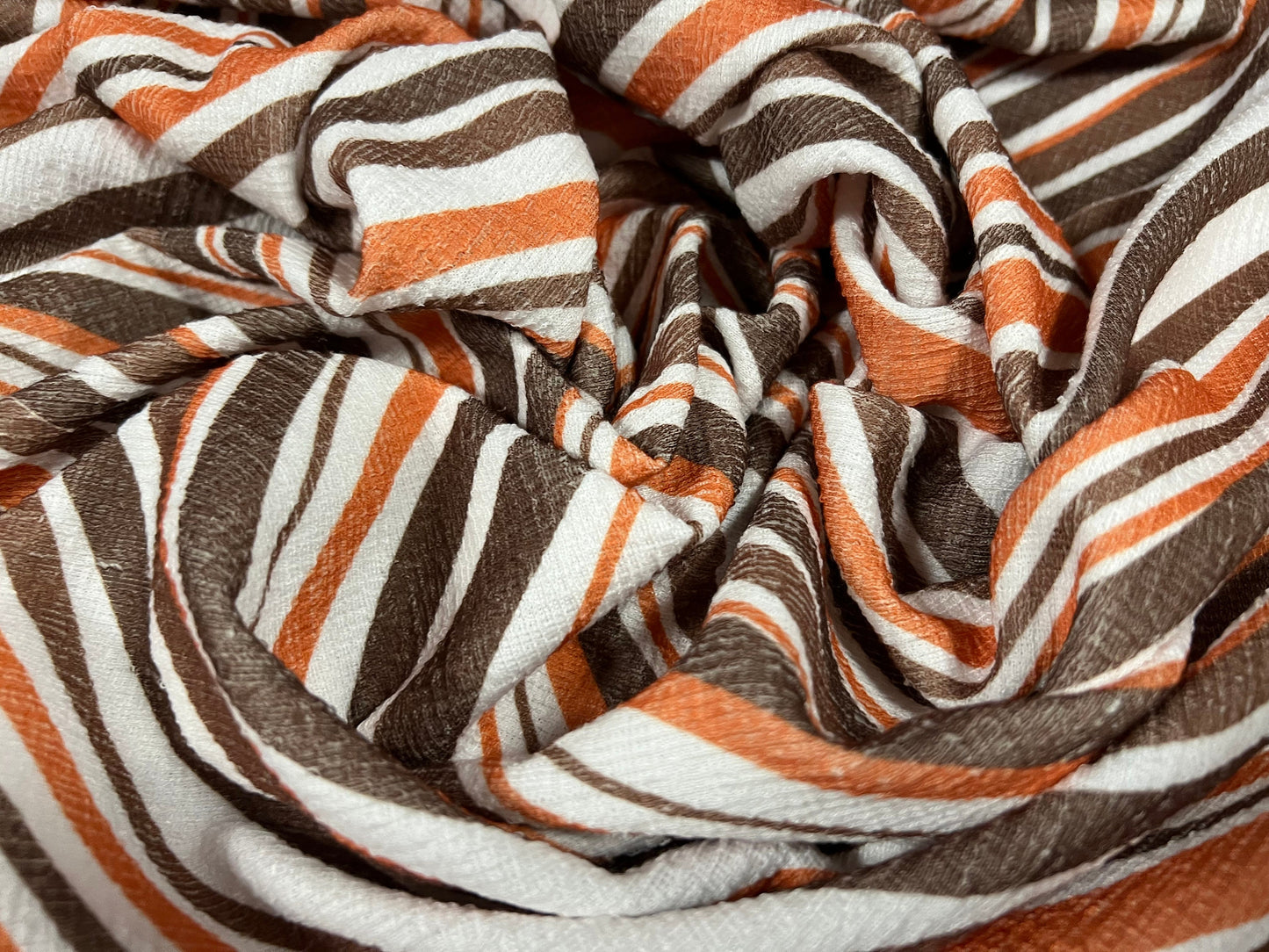 Strawcloth textured double jersey stretch spandex fabric, per metre - wave print - white orange & brown