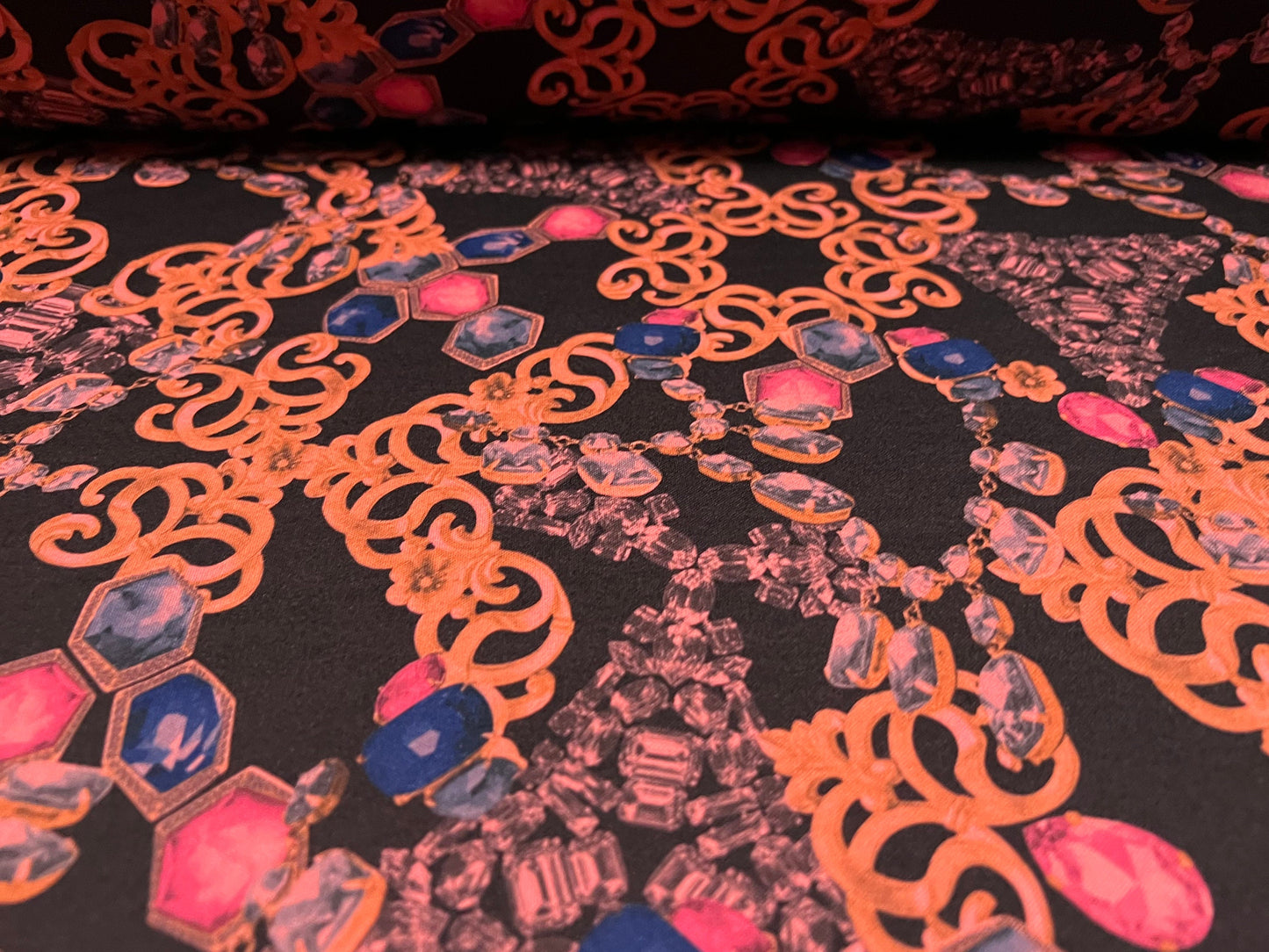 Scuba neoprene style double jersey stretch spandex fabric, per metre - gemstones and jewels print - black & peach