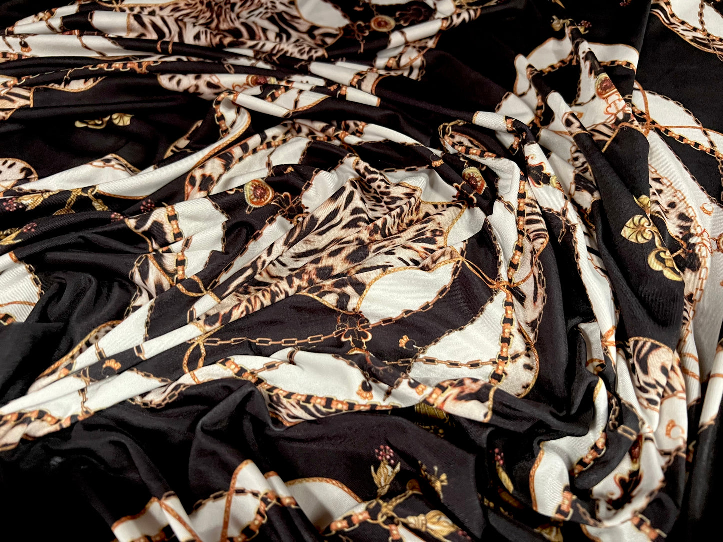 Soft touch stretch spandex jersey fabric, per metre - designer Leopardskin & chains print - black & gold