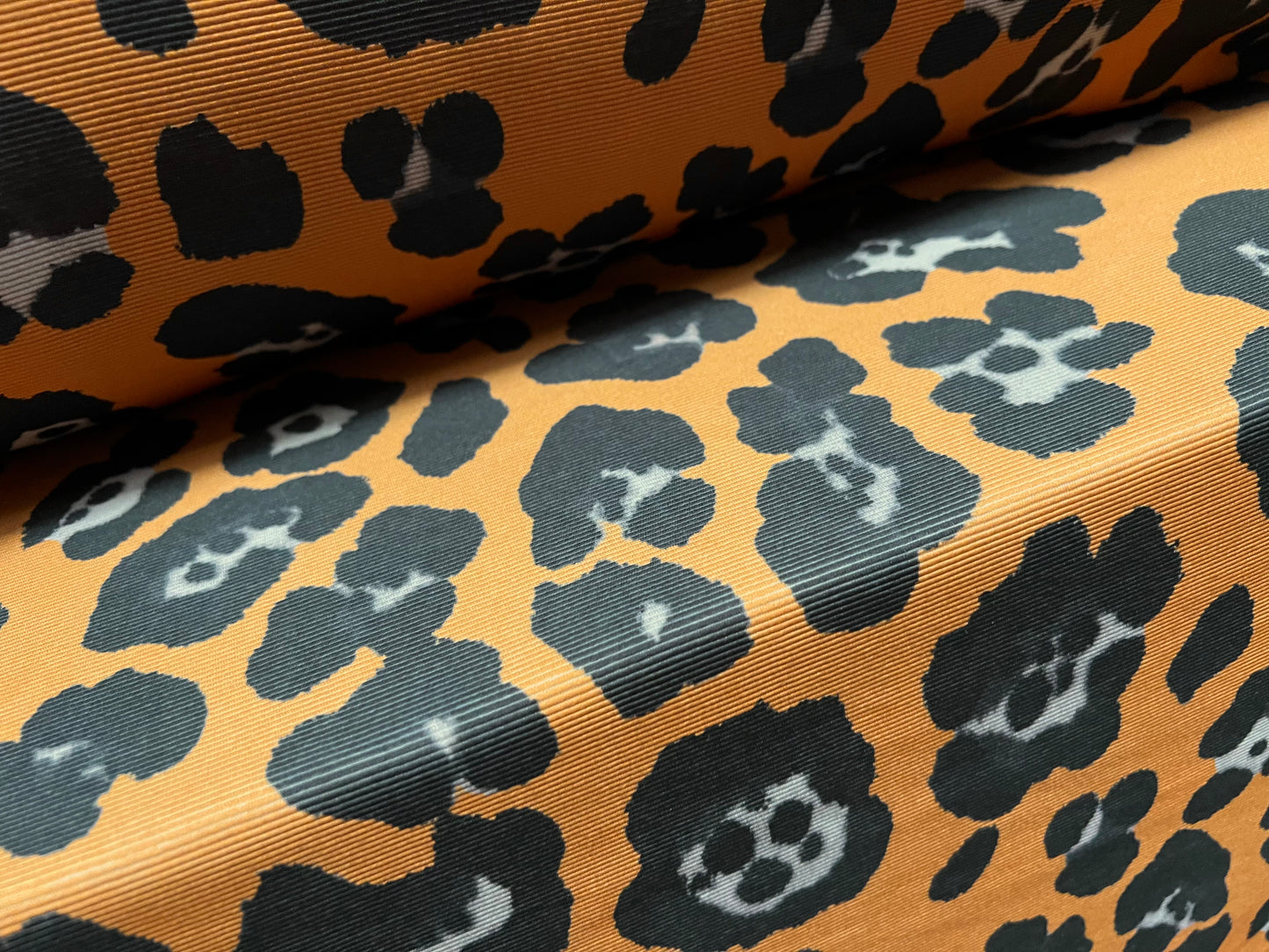 Fine Ottoman rib Stretch spandex jersey fabric , per metre - jaguar animal print - amber