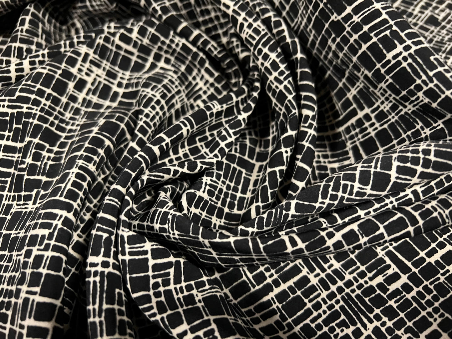 Powder touch woven dress blouse fabric, per metre - geometric print - black & cream