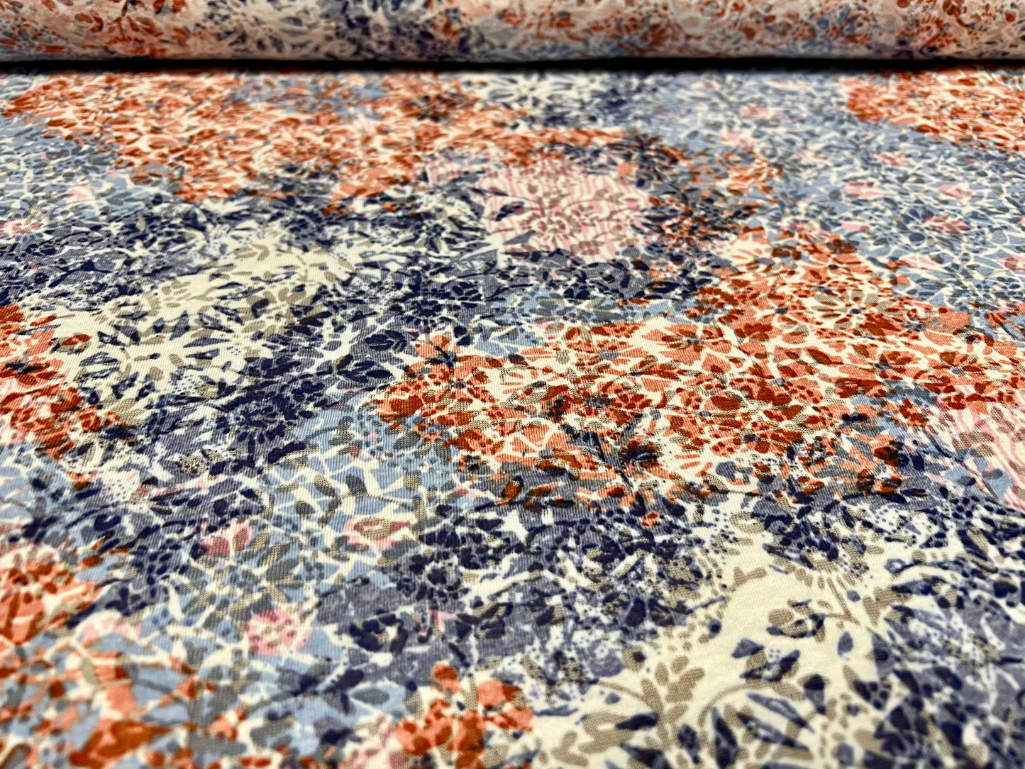 Lady Jessica lightweight burnout single jersey fabric, per metre - stylised floral print - blue & orange