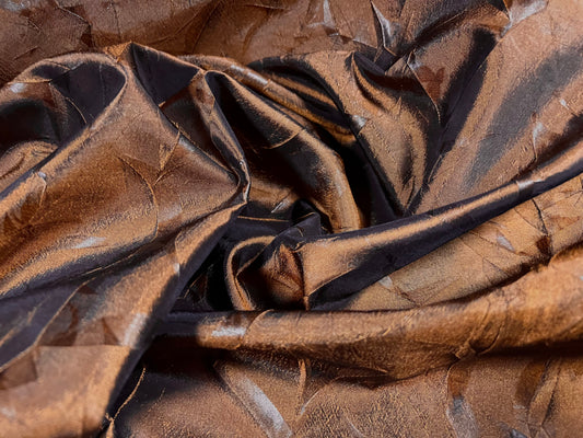 Taffeta woven dress fabric - pressed leaf design - copper brown