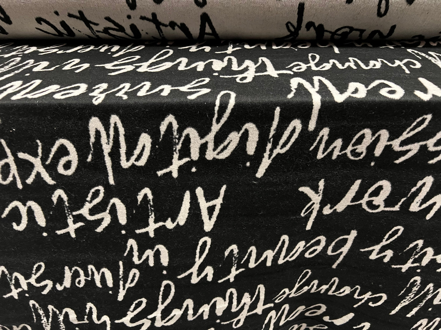 Wool mouflon flannel fabric, per metre - artistic diversity words jacquard - black & grey