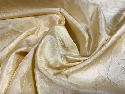 Taffeta woven dress fabric - pressed leaf design - cream