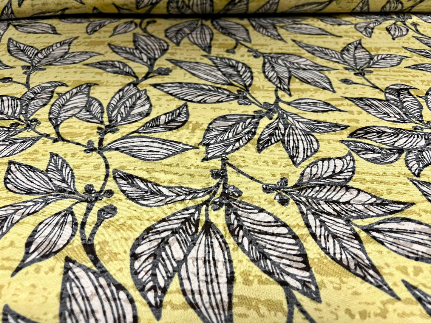 Lady K lightweight burnout single jersey fabric, per metre - leaves print - lemon