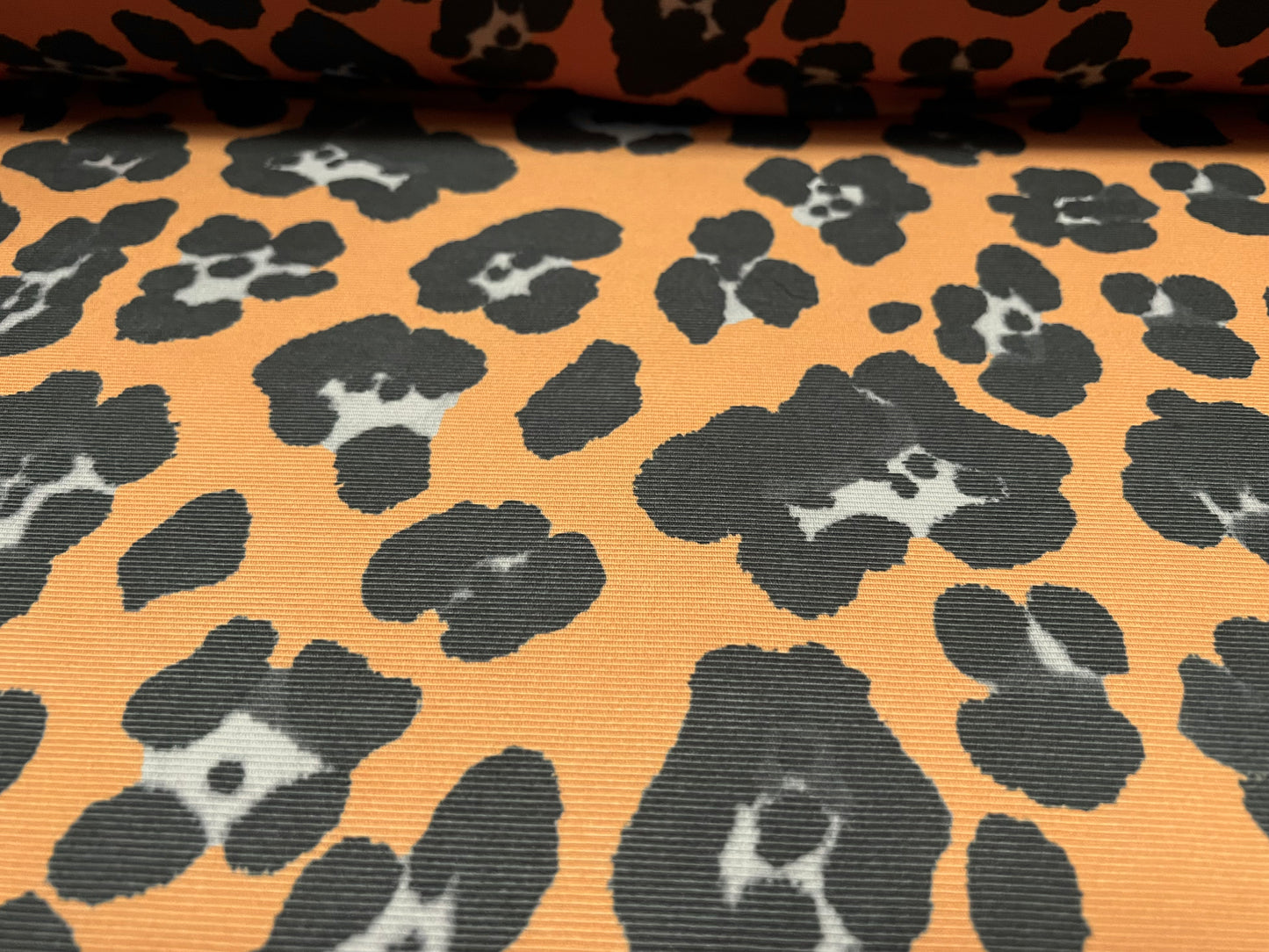 Fine Ottoman rib Stretch spandex jersey fabric , per metre - jaguar animal print - amber